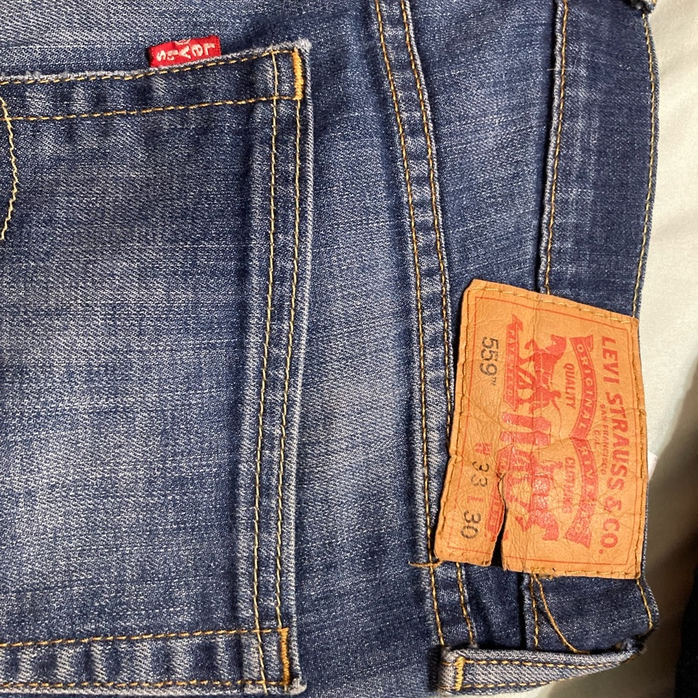 Levi’s 559 Dark Blue faded look on thighs w33 l30 worn only a handful of times.